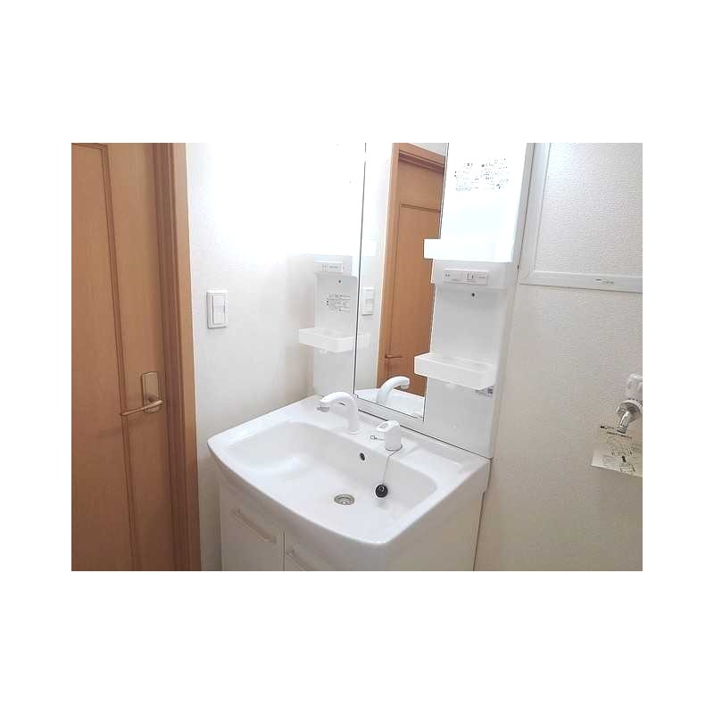 ��ʌ������s�V�P���̃A�p�[�g�̐��ʏ�