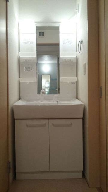 ��ʌ�����s���R�S���ڂ̃A�p�[�g�̐��ʏ�