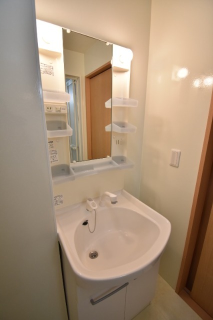 ��ʌ��������܎s�k��{�����̃A�p�[�g�̐��ʏ�