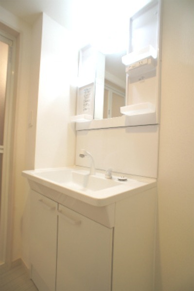 ��ʌ�����s�����R���ڂ̃}���V�����̐��ʏ�