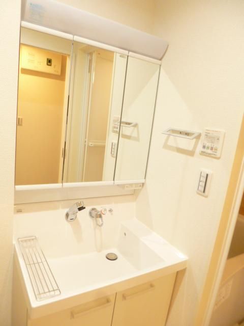 ��ʌ��������܎s��{����ؒ��P���ڂ̃}���V�����̐��ʏ�