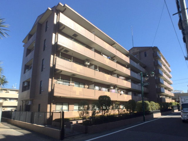 ��ʌ������s�X�쒬�̃}���V�����̌����O��