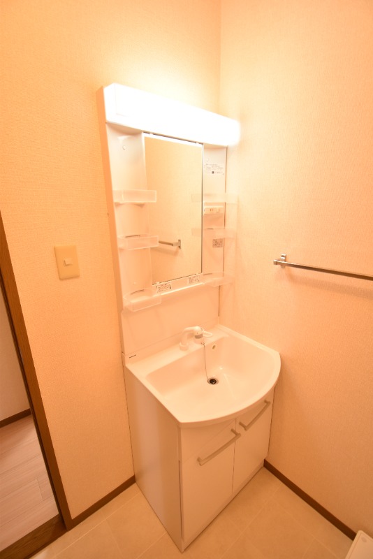 ��ʌ��������܎s�Y�a��c�R���̃A�p�[�g�̐��ʏ�