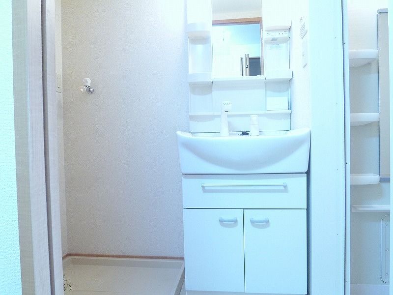 ��ʌ�����s��؂P���ڂ̃}���V�����̐��ʏ�