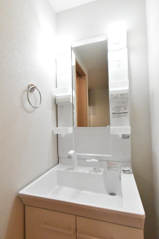 ��ʌ��z�J�s�k�z�J�Q���ڂ̃A�p�[�g�̐��ʏ�