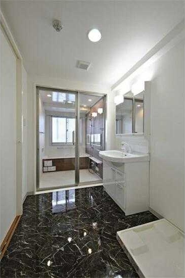 ��ʌ��������܎s��΋撇���P���ڂ̃}���V�����̐��ʏ�