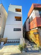 ��ʌ������s�{���U����3-21�̃A�p�[�g�̌����O��