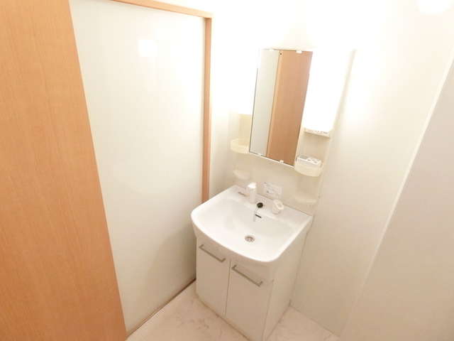 ��ʌ��������܎s��{��O���Q���ڂ̃A�p�[�g�̐��ʏ�