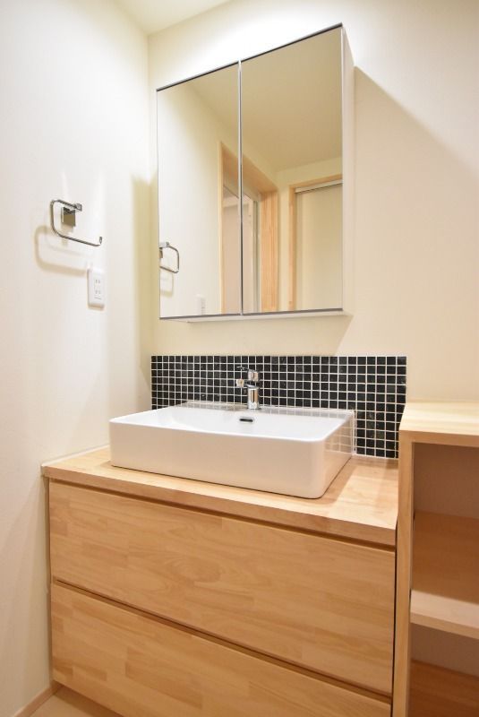 ��ʌ�����s������T���ڂ̃A�p�[�g�̐��ʏ�