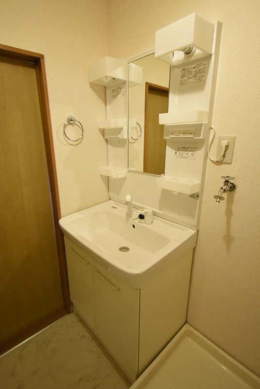 ��ʌ�����s�t���P���ڂ̃A�p�[�g�̐��ʏ�