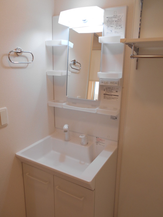 ��ʌ��z�J�s���������̃A�p�[�g�̐��ʏ�