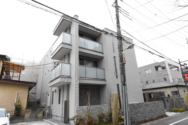 ��ʌ��������܎s��{����ؒ��S���ڂ̃}���V�����̌����O��