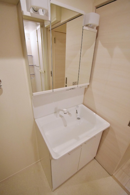 ��ʌ��������܎s��{����ؒ��S���ڂ̃}���V�����̐��ʏ�