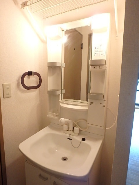 ��ʌ��������܎s��{����\���Q���ڂ̃A�p�[�g�̐��ʏ�