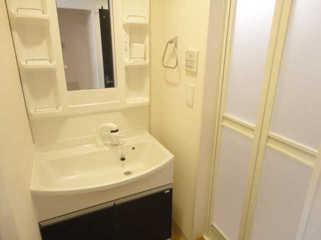 ��ʌ�����s�厚������̃}���V�����̐��ʏ�