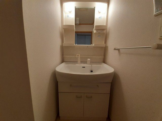 ��ʌ�����s���L�P���ڂ̃A�p�[�g�̐��ʏ�