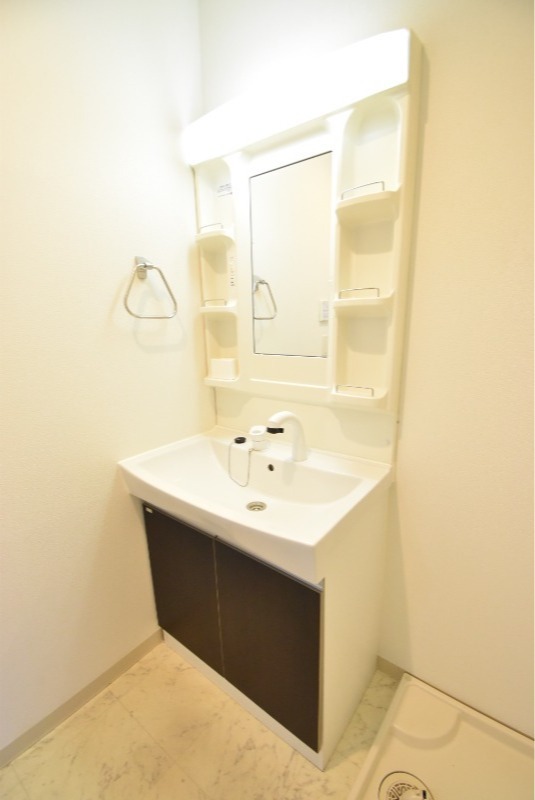 ��ʌ�����s������R���ڂ̃}���V�����̐��ʏ�