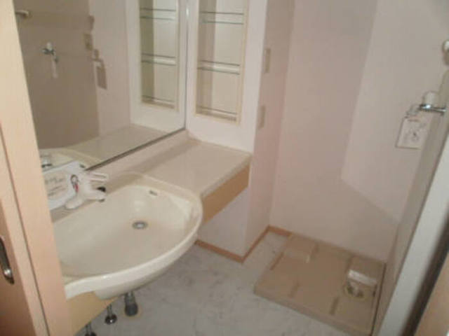 ��ʌ��������܎s�k�捡�H���̃A�p�[�g�̐��ʏ�