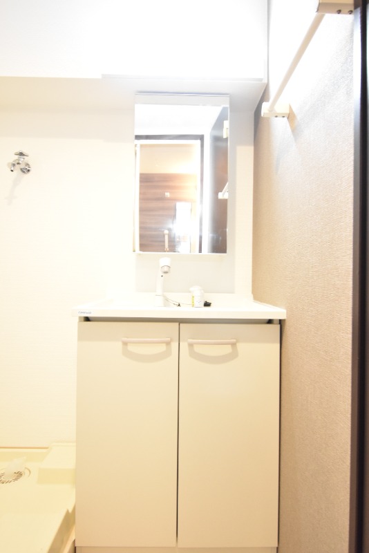 ��ʌ��������܎s��{����ؒ��S���ڂ̃}���V�����̐��ʏ�