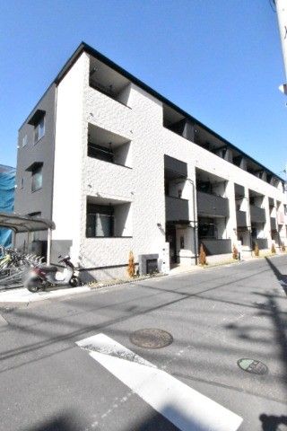 埼玉県川口市南鳩ヶ谷１丁目15-11のアパートの建物外観
