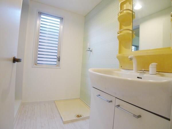 ��ʌ������s�����T���ڂ̃}���V�����̐��ʏ�