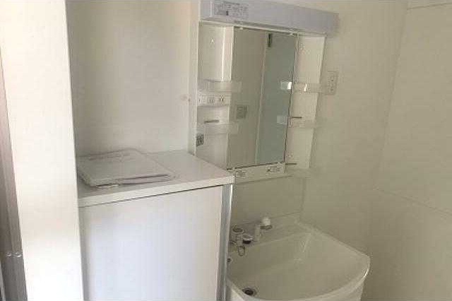 ��ʌ��������܎s�k����i���Q���ڂ̃A�p�[�g�̐��ʏ�