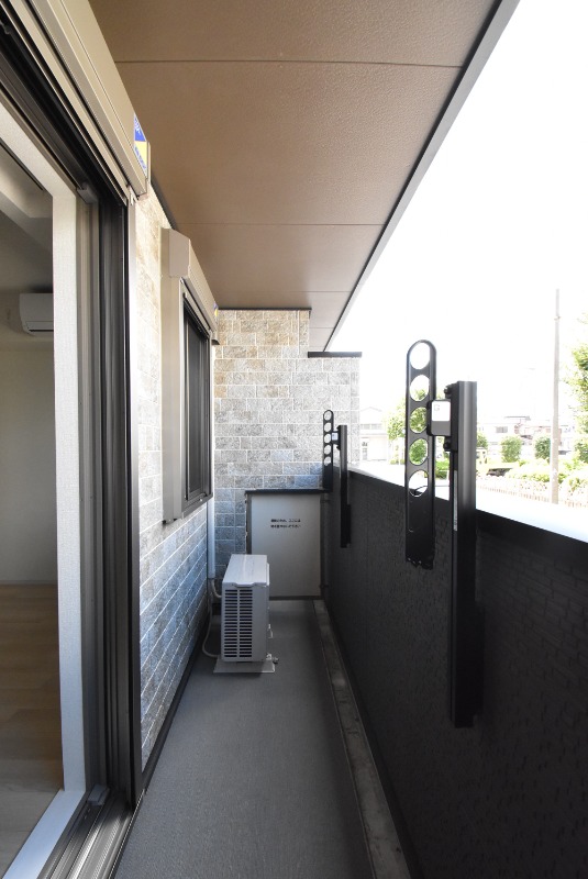 ��ʌ�����s�����U���ڂ̃A�p�[�g�̃o���R�j�[