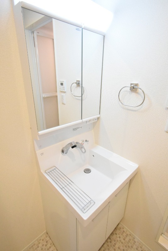 ��ʌ��������܎s��{�捂�@���P���ڂ̃}���V�����̐��ʏ�