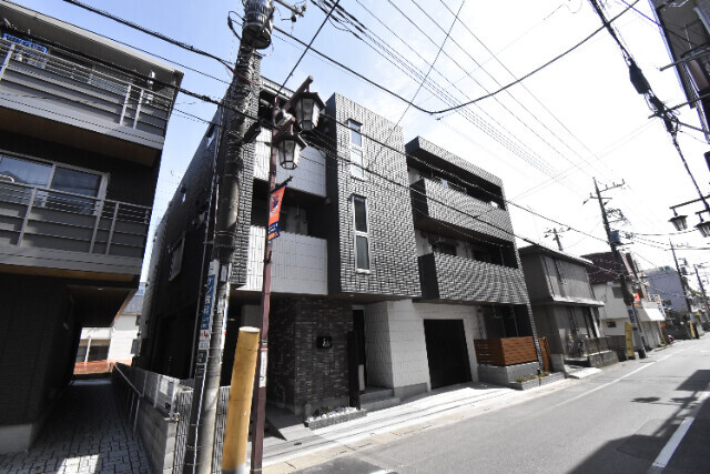 ��ʌ��������܎s��{����ؒ��S���ڂ̃}���V�����̌����O��