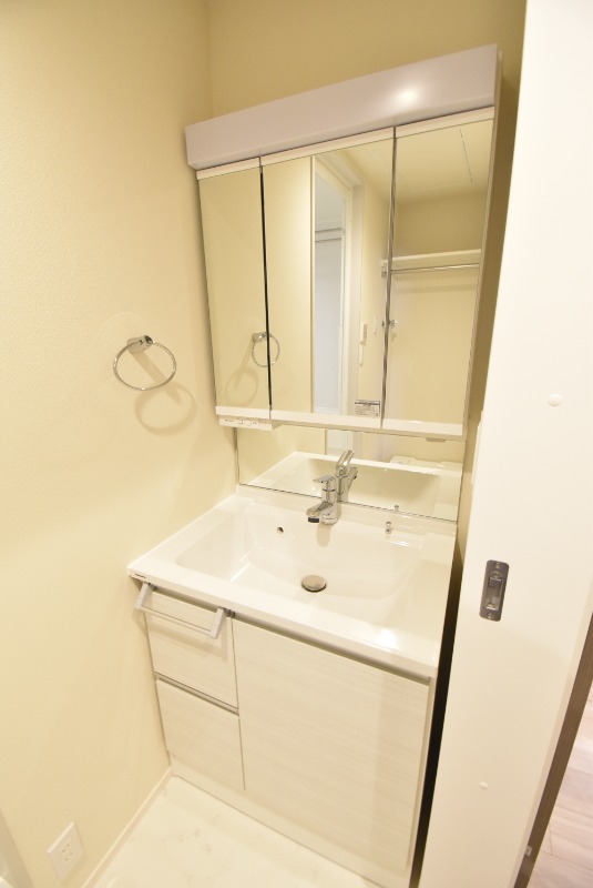 ��ʌ��������܎s��{����ؒ��S���ڂ̃}���V�����̐��ʏ�