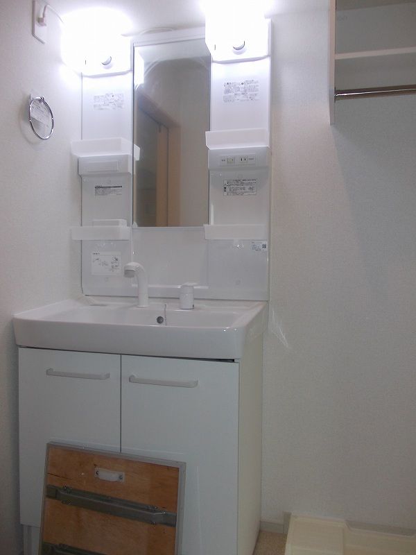 ��ʌ��z�J�s���͒��T���ڂ̃A�p�[�g�̐��ʏ�