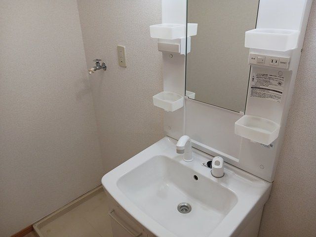 ��ʌ�����s�厚�����̃A�p�[�g�̐��ʏ�