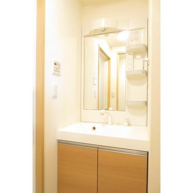 ��ʌ�����s�{���Q���ڂ̃}���V�����̐��ʏ�