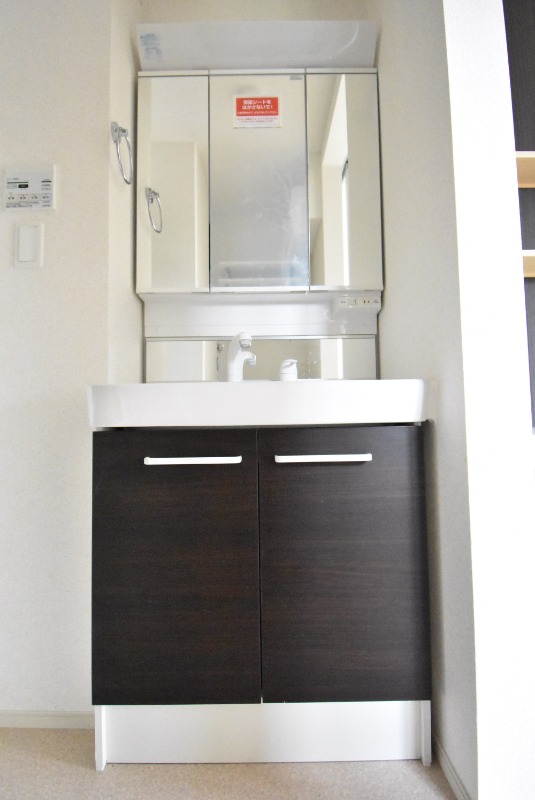 ��ʌ��������܎s����厚�w��̃A�p�[�g�̐��ʏ�