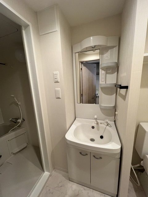 ��ʌ������s�����S���ڂ̃}���V�����̐��ʏ�