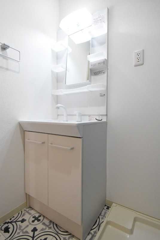 ��ʌ��������܎s��{���咬�R���ڂ̃}���V�����̐��ʏ�