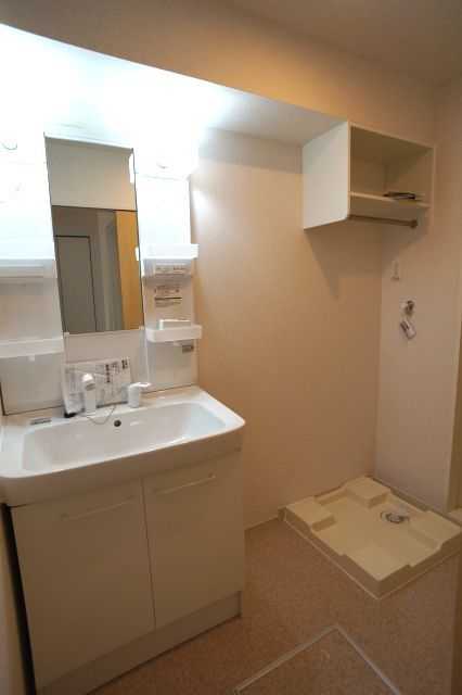 ��ʌ��������܎s�k��ʏ����̃A�p�[�g�̐��ʏ�