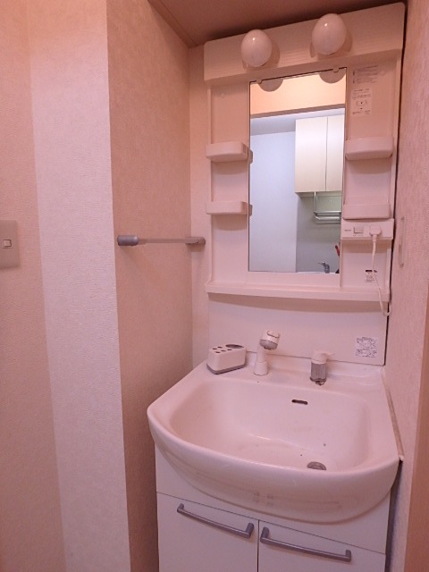 ��ʌ��������܎s��{��㏬���̃}���V�����̐��ʏ�