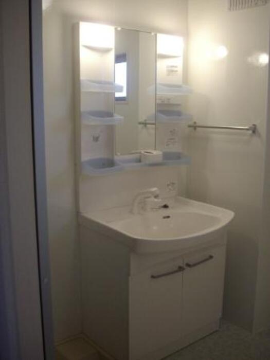 ��ʌ�����s�厚�����̃A�p�[�g�̐��ʏ�