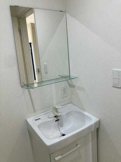 ��ʌ�����s�厚���s�̃A�p�[�g�̐��ʏ�