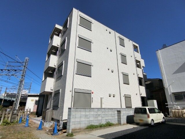 ��ʌ��������܎s��{��y�蒬�R����157�̃}���V�����̌����O��