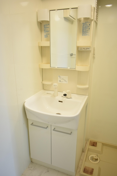 ��ʌ��������܎s��{��㏬���̃A�p�[�g�̐��ʏ�