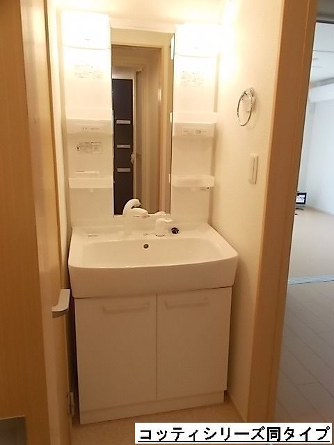 ��ʌ������s�������̃A�p�[�g�̐��ʏ�