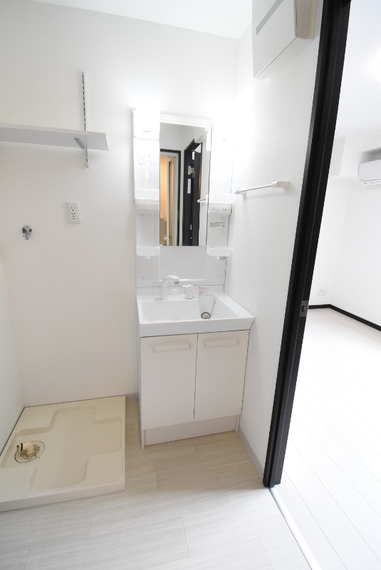 ��ʌ��������܎s�k��{�����Q���ڂ̃}���V�����̐��ʏ�