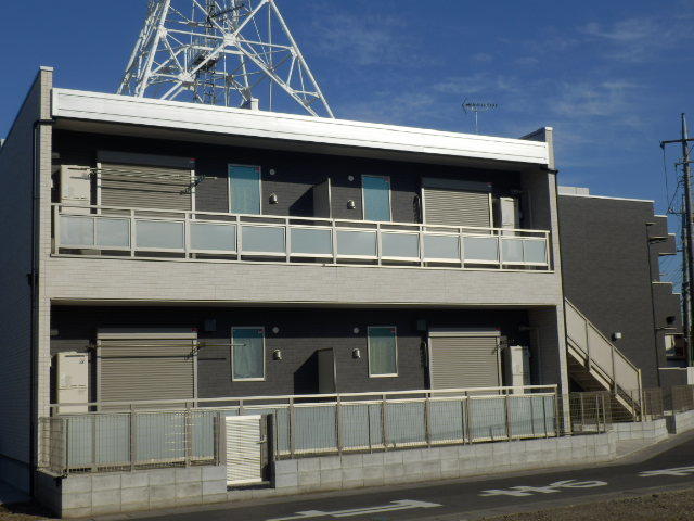 ��ʌ�����s��c�{�̃A�p�[�g�̌����O��