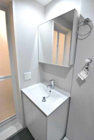 ��ʌ��z�J�s�����c���̃A�p�[�g�̐��ʏ�