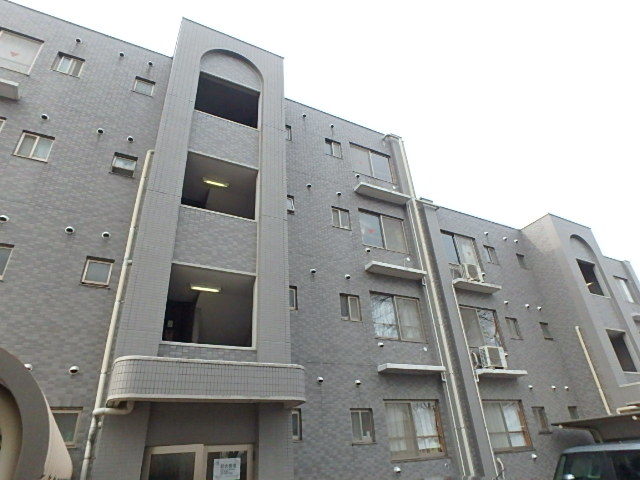 ��ʌ��������܎s�k��{�����̃}���V�����̌����O��