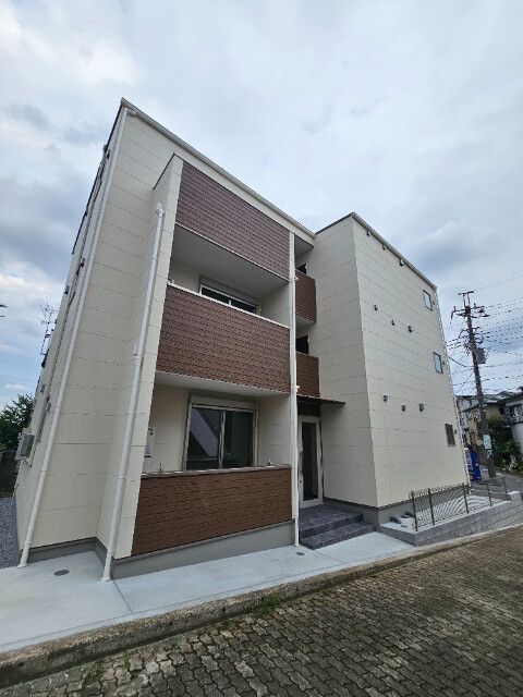 ��ʌ��������܎s�k��{�����̃A�p�[�g�̌����O��