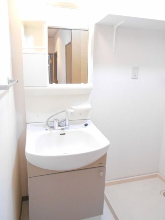 ��ʌ��������܎s�k�捡�H���̃A�p�[�g�̐��ʏ�