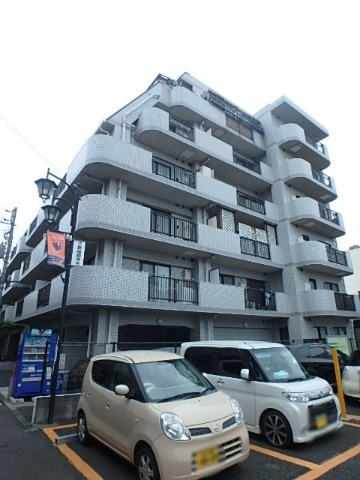 ��ʌ��������܎s��{��{���S���ڂ̃}���V�����̒��ԏ�